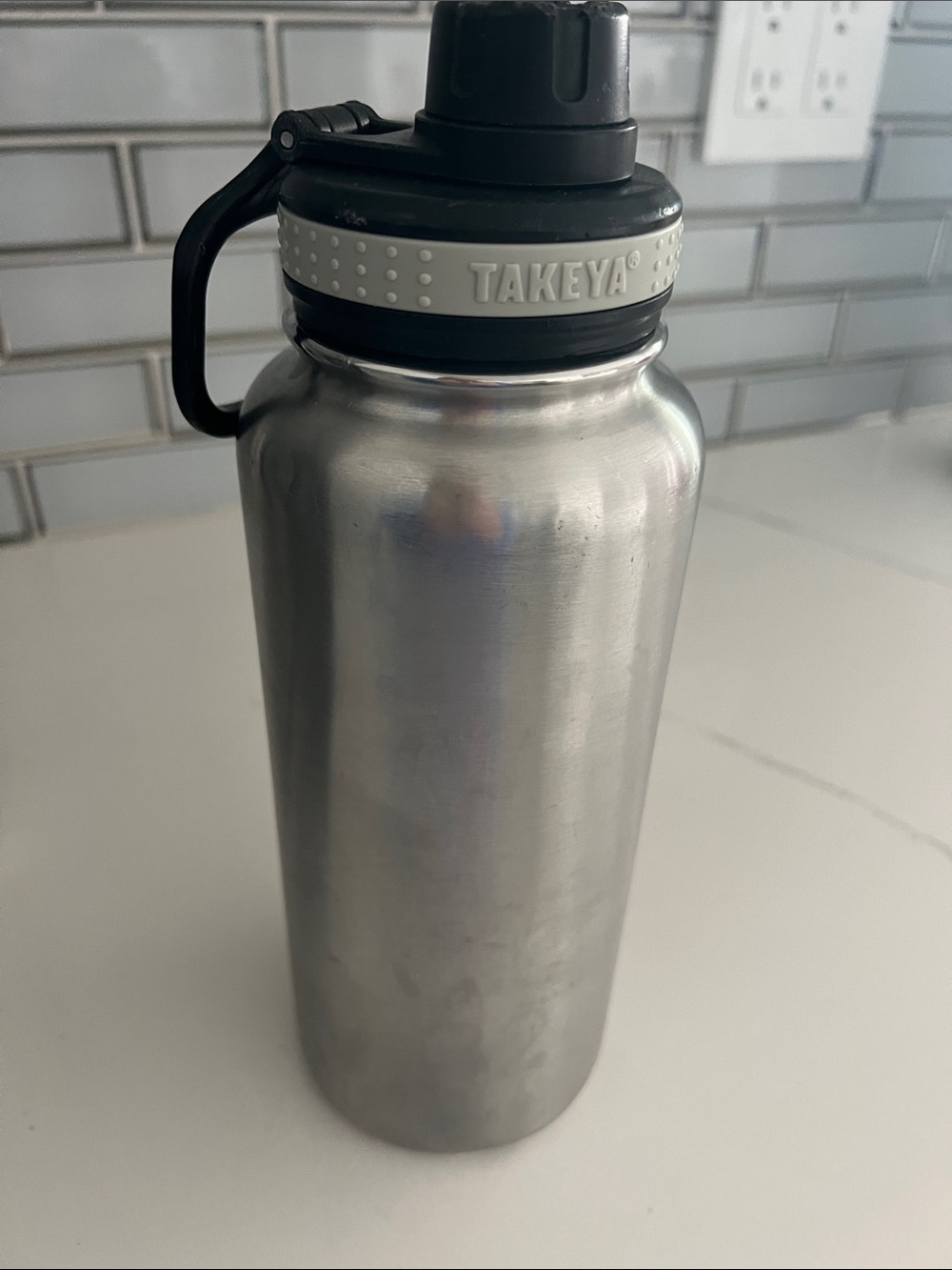 Takeya Stainless Steel Water Bottle with Grey Black Lid used only for water